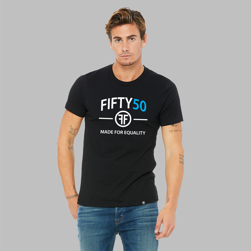 A man wearing a black t-shirt with a logo. The text on the tee is in white and turquoise and says Fifty50 and Made for Equality.