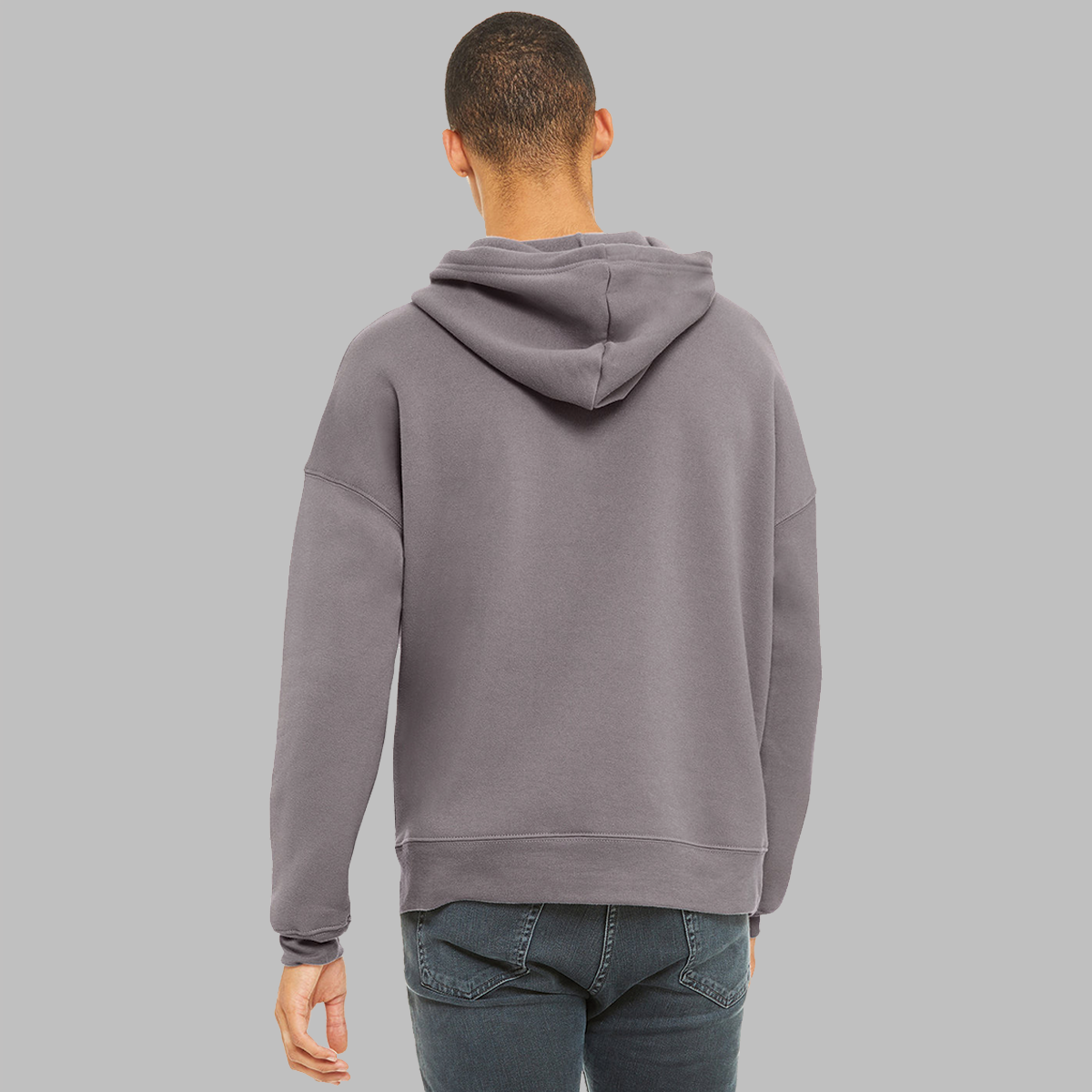 The back of a man wearing a political hoodie that is slate purple. It shows a loose fit and that there are no graphics.