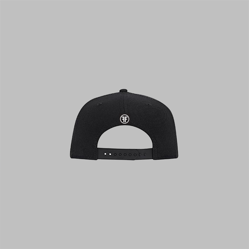 Back of a black snapback hat. A black label is sewn on the back, with two white Fs, back to back, surrounded by a circle.