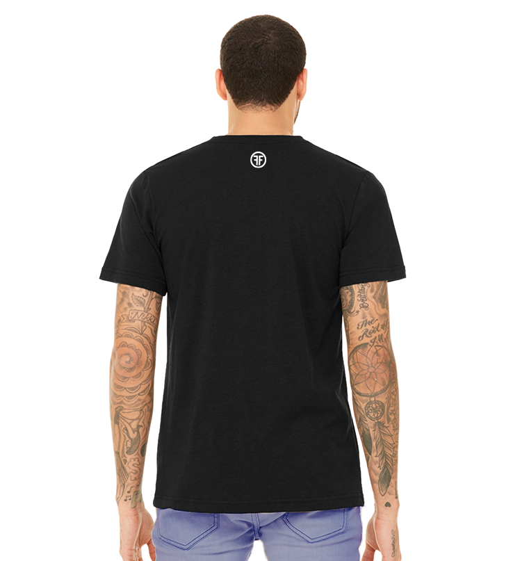 The back of a man in a black t-shirt to show the fit. There is a white logo at the neckline with two Fs back to back in a white circle.