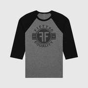 A heather grey equality baseball tshirt with heather black arms and collar. The text of the black graphic says Fifty50, Equality, and has two Fs, back to back in a circle.