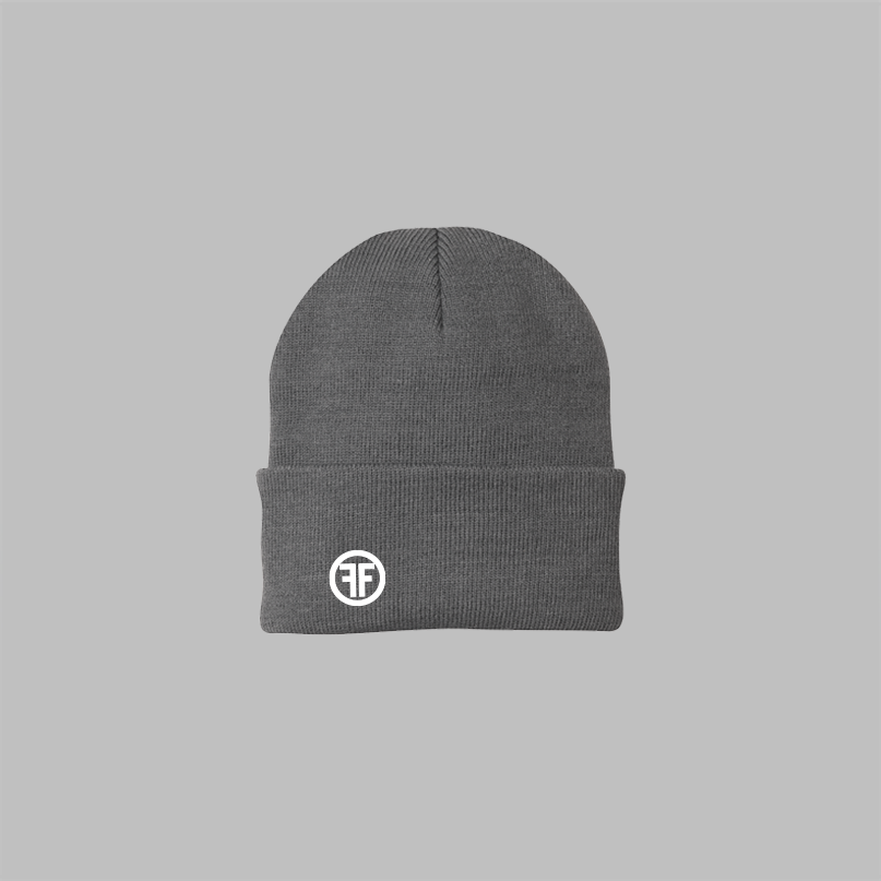 A grey beanie with a rolled up cuff. It has a white embroidered logo with two Fs, back to back, outlined by a circle, on the right front.