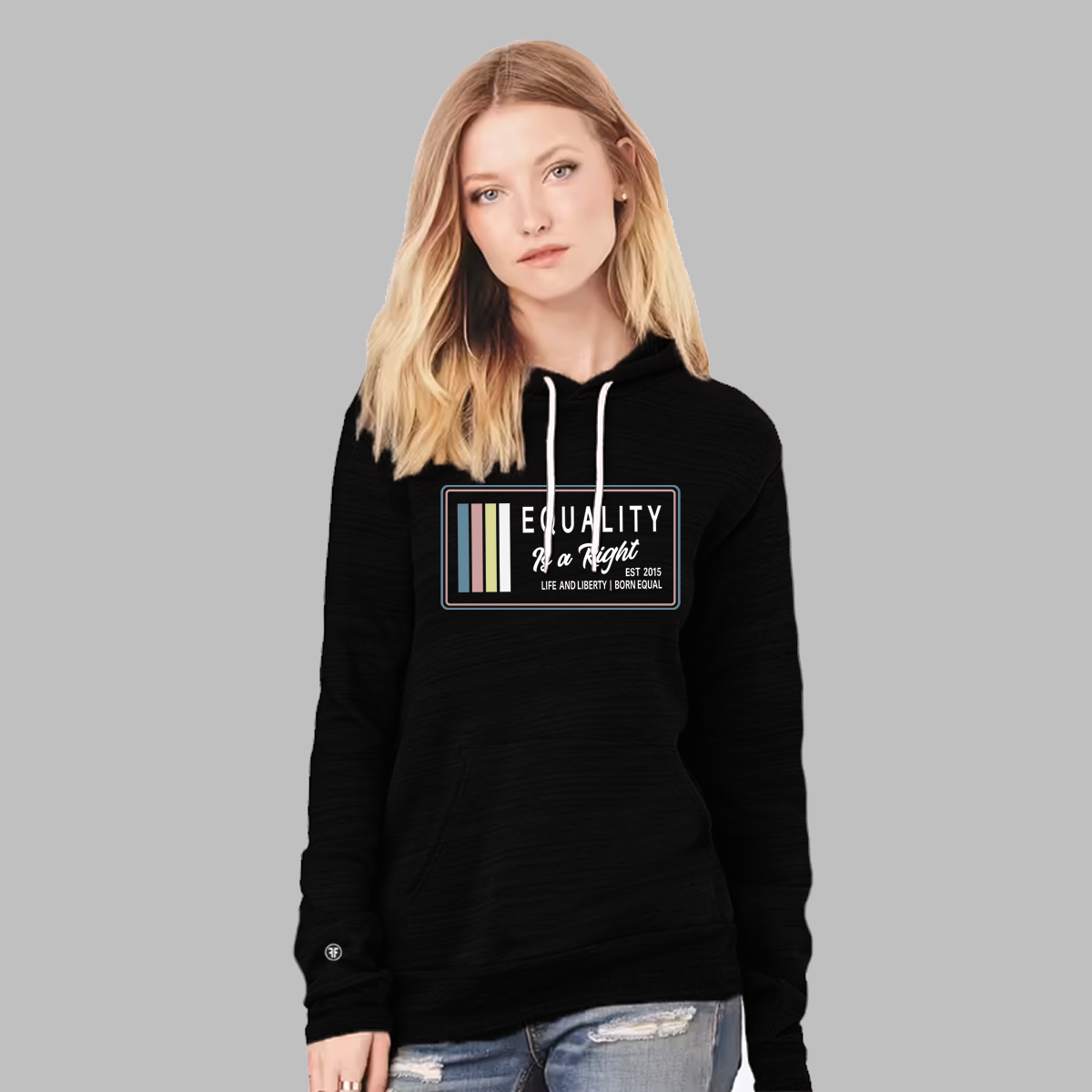 A lady wearing an equal rights black hoodie with the text, Equality, Life and Liberty, and Born Equal, in white bold font. The text, Is a Right, is in white script font. On the side of the logo are stripes of the colors Slate Blue, Dusty Rose, Bisque Gold, and white.