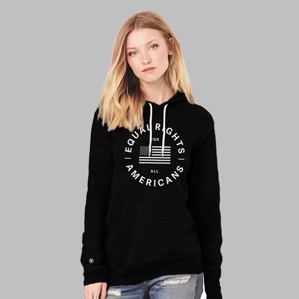 A lady wearing a political, unisex black hoodie. The graphic is a white American flag with text Equal Rights For All Americans around it in bold white font.