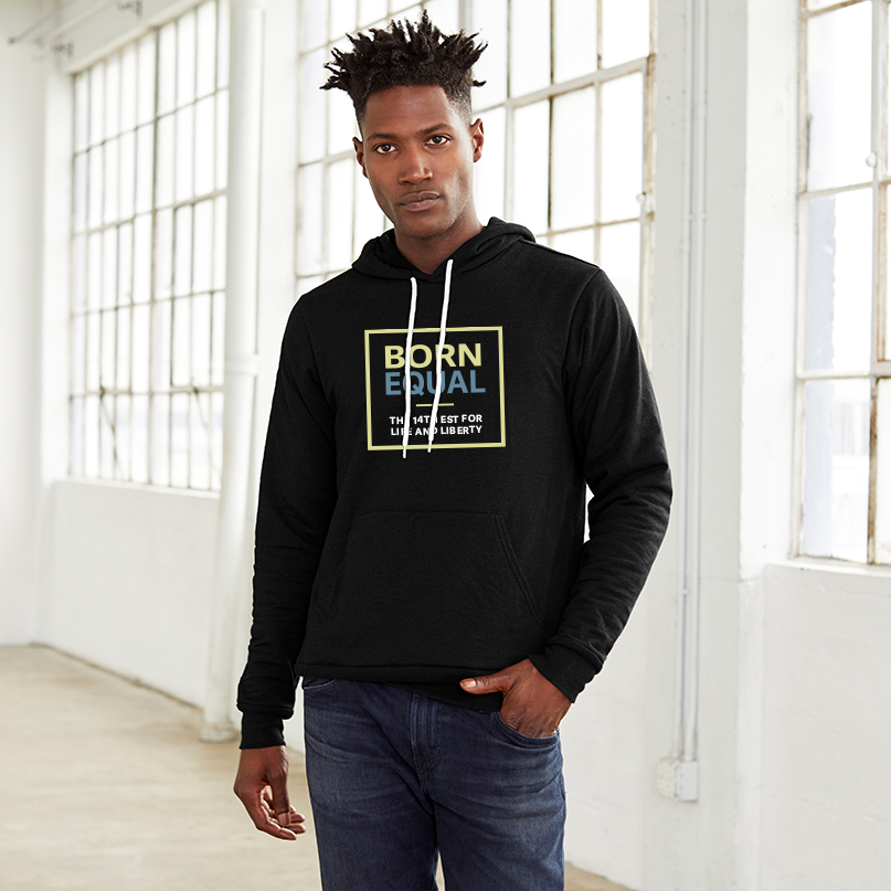 Man posing in a black equality hoodie with a large center chest logo. The text Born is in Bisque Gold, bold font, while Equal is in Slate Blue, bold font.