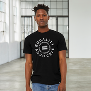 Man wearing a black human rights tshirt with a light grey logo. An equal sign is in the middle with the text Equality Advocate, in a circle, and pro women's, lgbtq, and minority rights in a smaller circle.