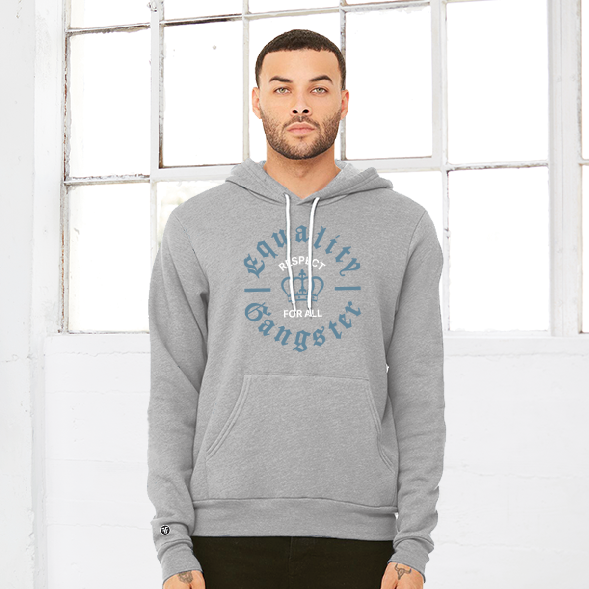 A man wearing a light grey equality hoodie with the text, Equality Gangster in Slate Blue Old English font. A Slate Blue crown is in the center, and in between is the text, Respect for All, in white bold font.