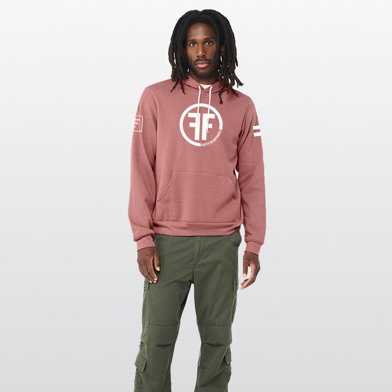 A man wearing a heather mauve equality hoodie with a white equal sign on left arm, and the text, Fifty 50 Apparel is made for equality, no more, no less, just equal, on the right arm. Center chest logo has two Fs, back to back outlined by a circle.