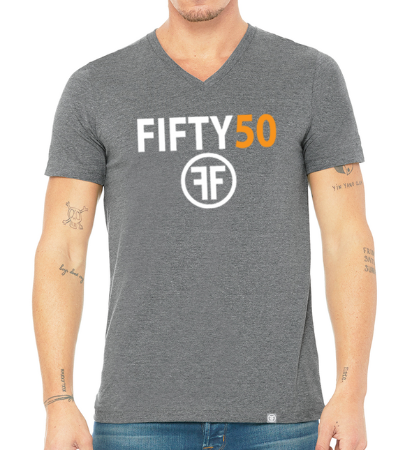 a male model wearing the relevant v-neck t-shirt which is a grey tee with a white and orange logo by Fifty50 Apparel