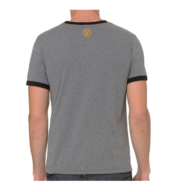 The back of a man wearing a grey ringer t-shirt with black arm and neck trim. The orange logo is below the collar, and is two Fs, back to back, in a circle.