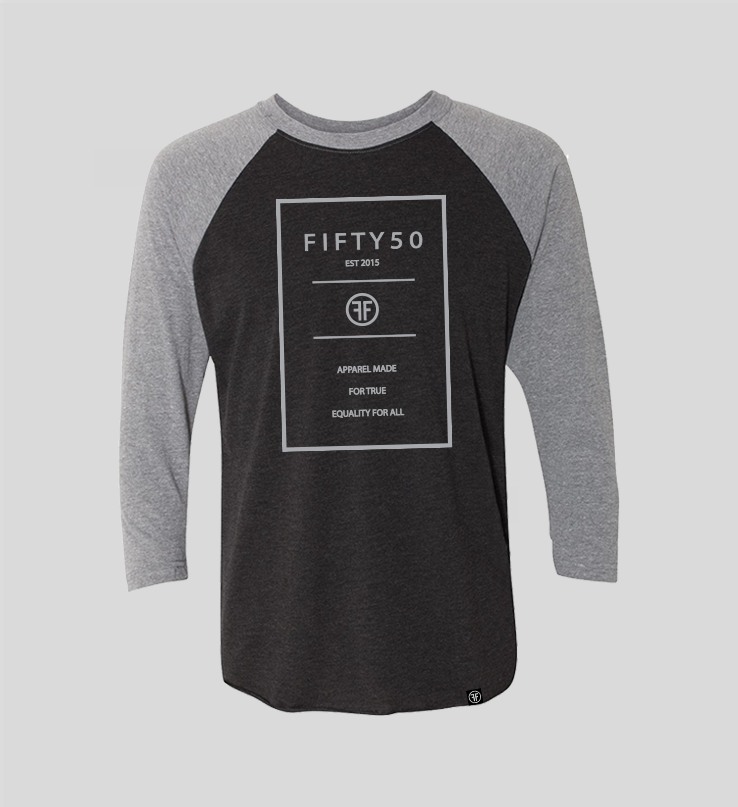 A heather black baseball t-shirt with heather grey arms and collar. The logo is a grey rectangle with the grey text Fifty 50, and Apparel Made For True Equality for All inside of it.